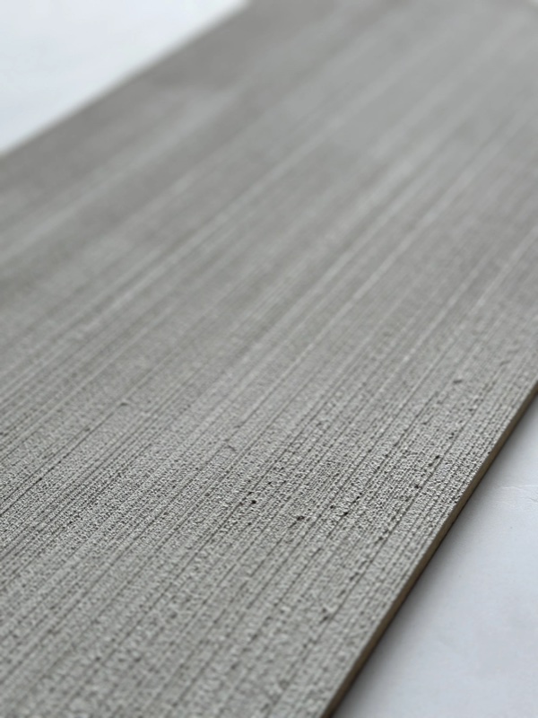 Macro diagonal close-up of a raked swatch showing fine parallel vertical grooves.