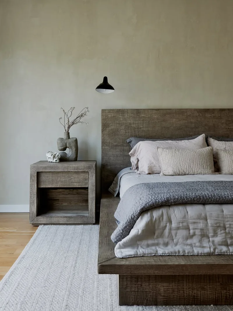 Calm bedroom with beige mineral plaster walls in soft daylight, Gates Mills, Ohio