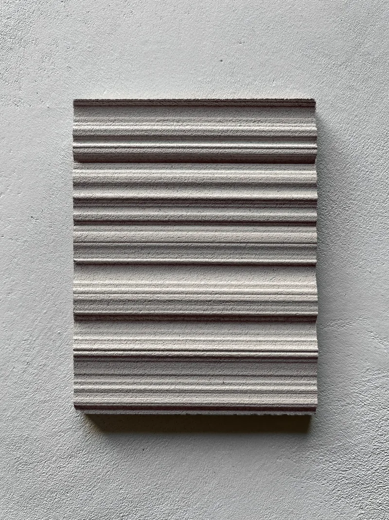 Fluted plaster finish specimen