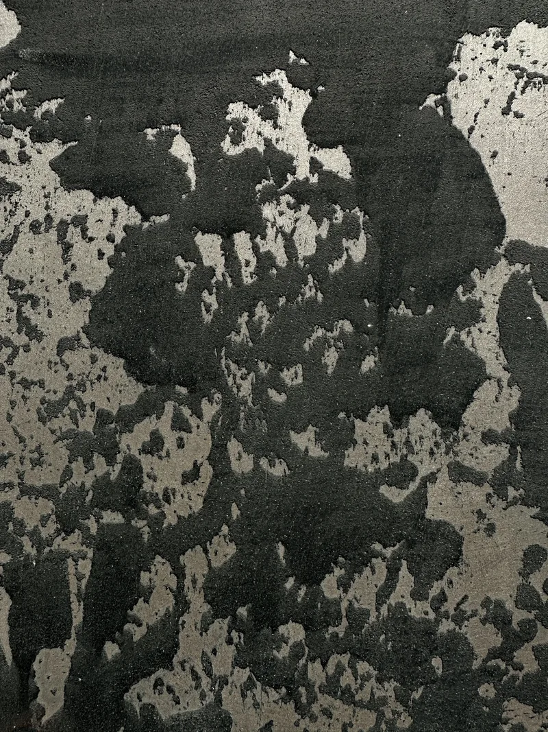 Mottled metal plaster finish specimen